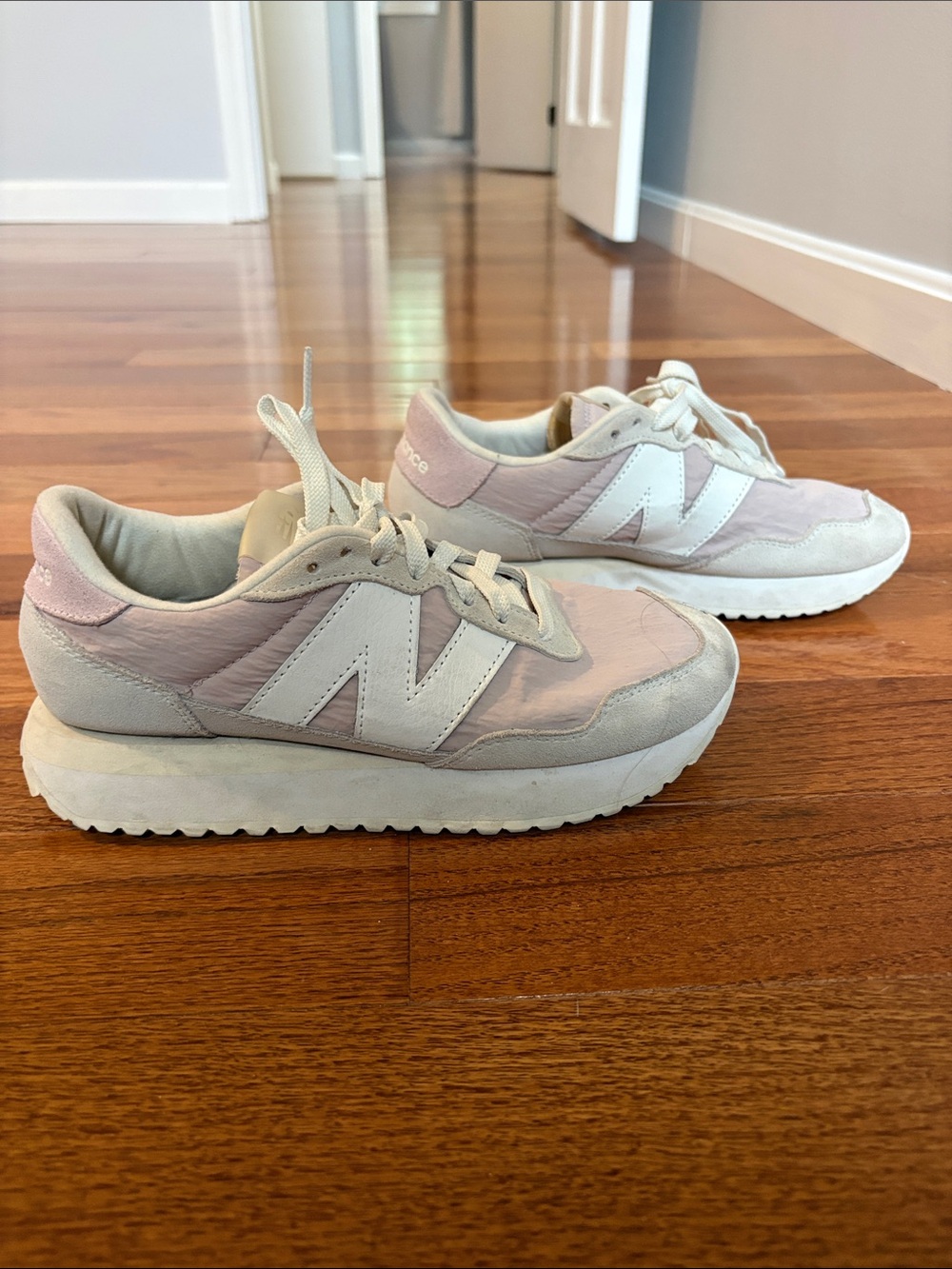 New Balance Women's Pink and White Runner Sneakers